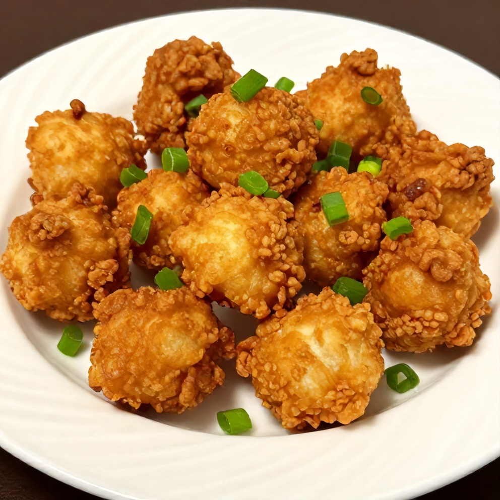 Plated hushpuppies with green onions