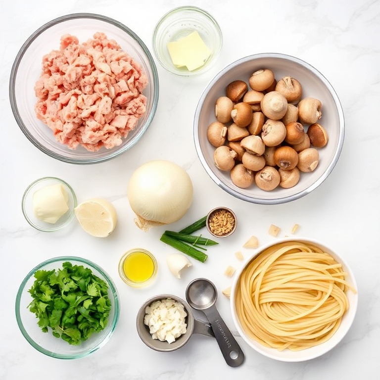 Raw ingredients for easy ground turkey stroganoff. Ground turkey, mushrooms, onion, garlic, and egg noodles in a flat lay with measuring tools.