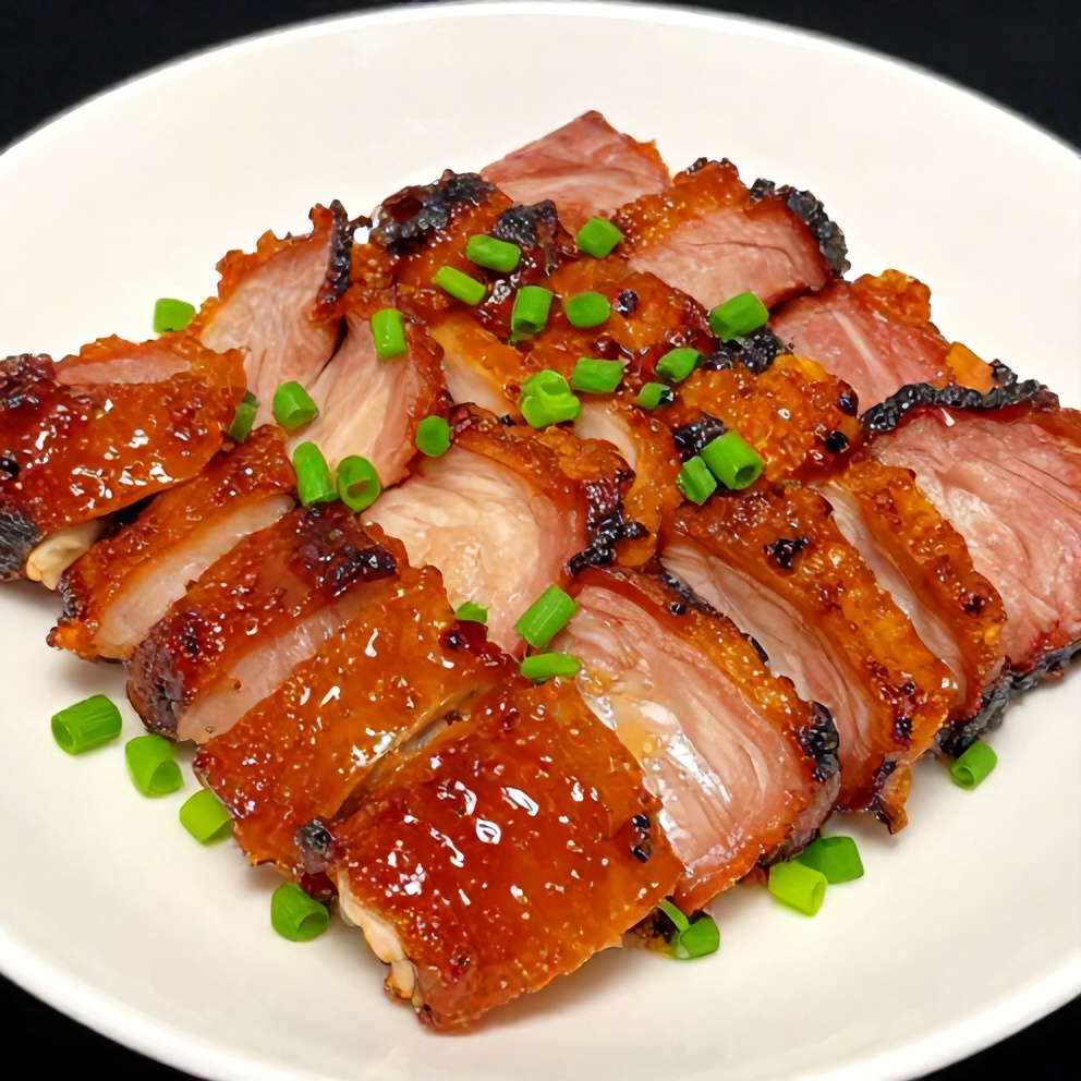 Plated Sticky Char Siu Chicken with green onions