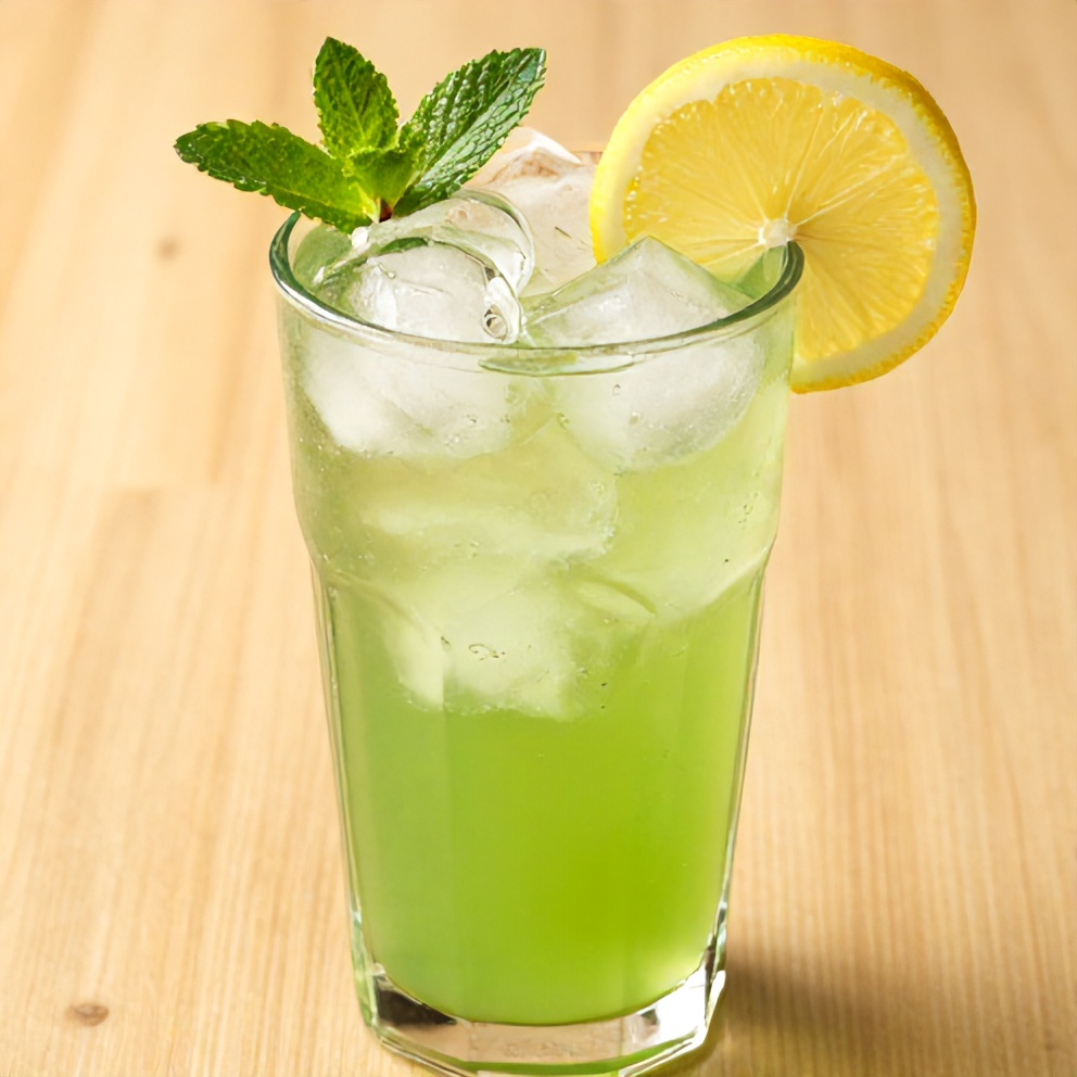 Glass of Mint and Lemon Verbena Iced Tea with a sprig of mint and lemon slice