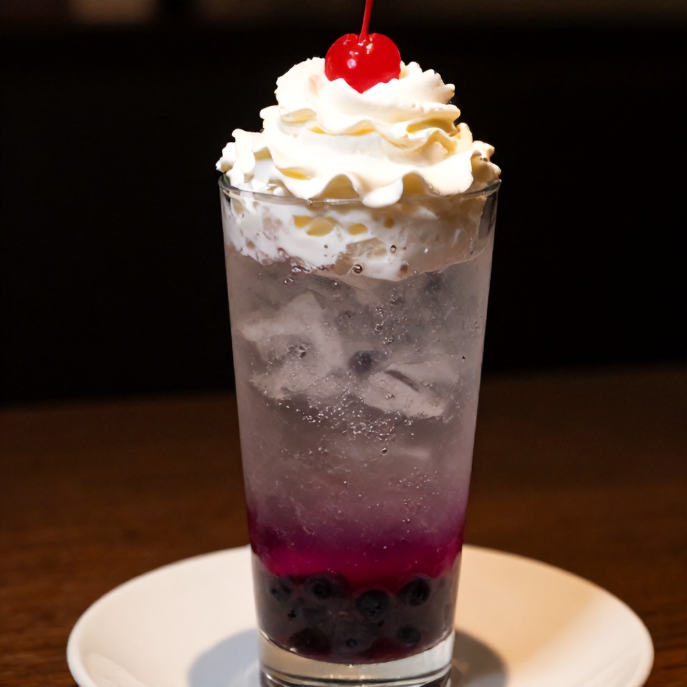 Italian cream soda with sugar free blueberry syrup, topped with whipped cream and a cherry